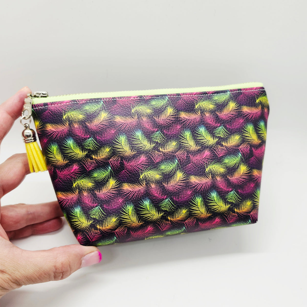 Smooth Faux Leather Stand Up Zip Bag, Neon Feathers Print